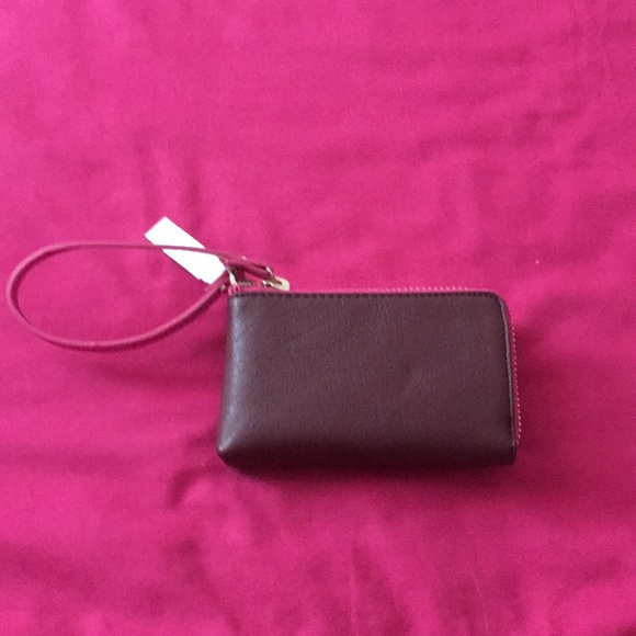 Small zip side wristlet. - Picture 3 of 5